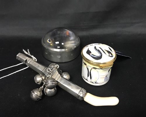 Lot 24 - A MOORCROFT PILL BOX WITH A SILVER MOUNTED MAGNIFYING GLASS AND SILVER BABY RATTLE