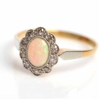 Lot 1654 - EARLY TWENTIETH CENTURY OPAL CLUSTER RING set...