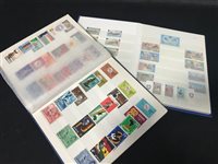 Lot 31 - A STOCK BOOK FULL OF ISLE OF MAN STAMPS