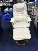 Lot 234 - A CREAM LEATHER ARMCHAIR AND STOOL