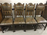 Lot 222 - A SET OF FOUR EDWARDIAN OAK DINING CHAIRS