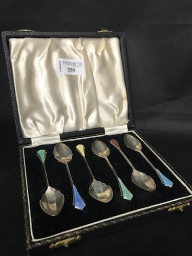 Lot 250 - A SET OF SIX ART DECO STYLE SILVER AND ENAMEL COFFEE SPOONS