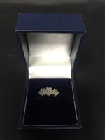 Lot 289 - A TRIPLE CLUSTER DIAMOND RING IN NINE CARAT GOLD