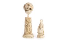 Lot 1017 - A CHINESE IVORY CONCENTRIC BALL AND A FIGURE