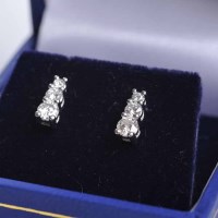 Lot 1690 - PAIR OF THREE STONE DIAMOND EARRINGS each set...