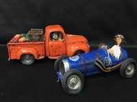 Lot 372 - A SCULPTURE OF A MAN IN A VINTAGE CAR BY GUILLERMO FORCHINO