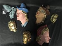 Lot 396 - SEVEN ART DECO STYLE WALL HANGING MASKS