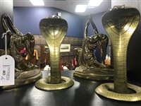 Lot 403 - TWO ART DECO STYLE BRASS GARNITURES WITH A PAIR OF COBRA FIGURES