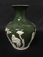 Lot 410 - A GREEN AND WHITE PORTLAND VASE