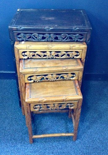 Lot 1029 - A CHINESE NEST OF TABLES