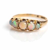 Lot 1711 - OPAL FIVE STONE RING with five graduated round...