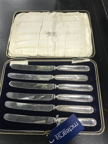 Lot 175 - A CASED SET OF SIX SILVER MOUNTED PASTRY KNIVES