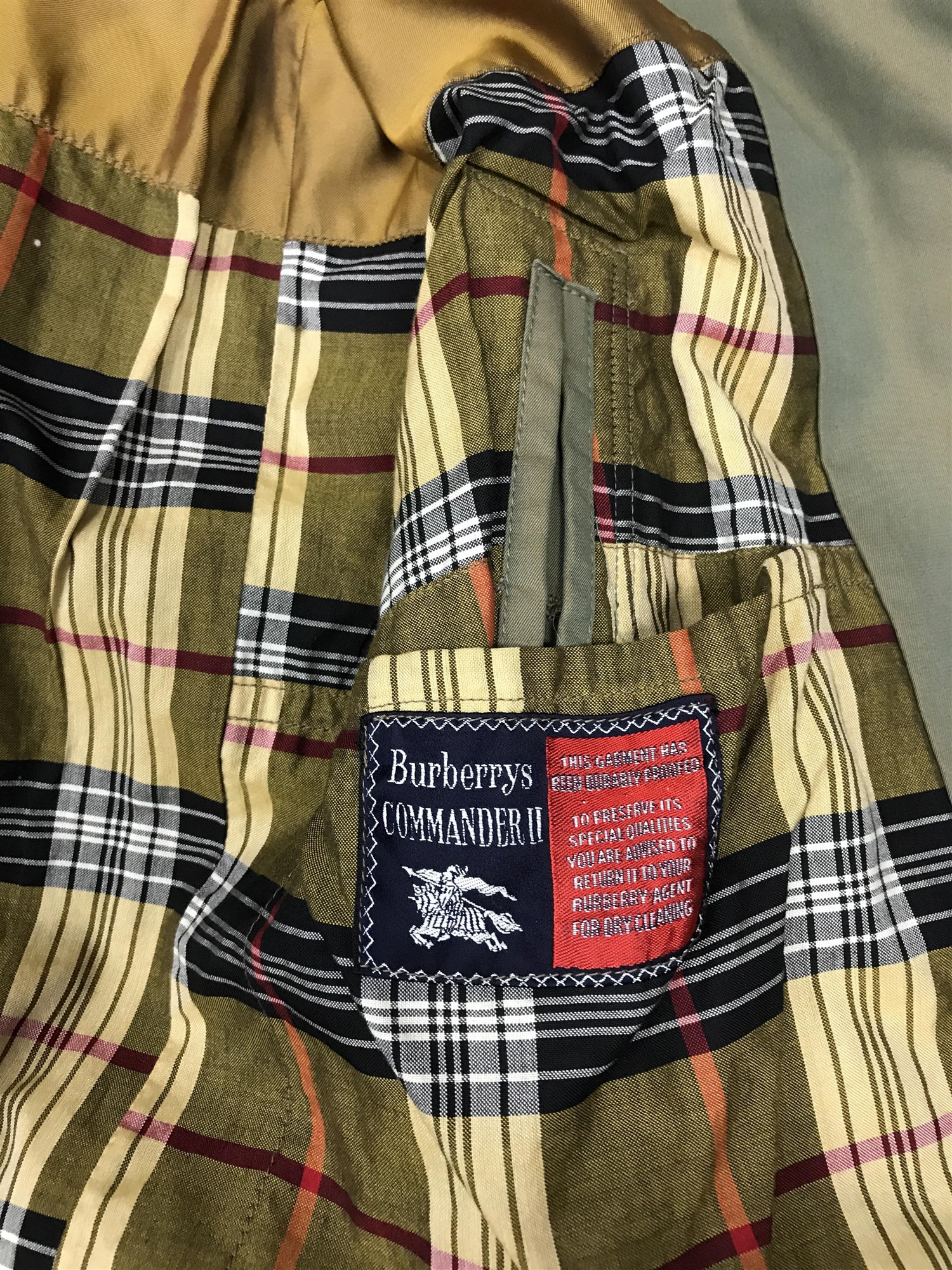 Lot 499 - TWO VINTAGE BURBERRY RAINCOATS