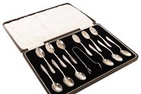 Lot 784 - A SET OF SILVER TEASPOONS AND TONGS