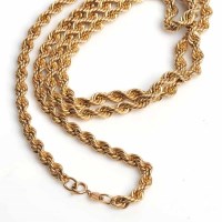 Lot 1735 - NINE CARAT GOLD CHAIN of woven form, marked...