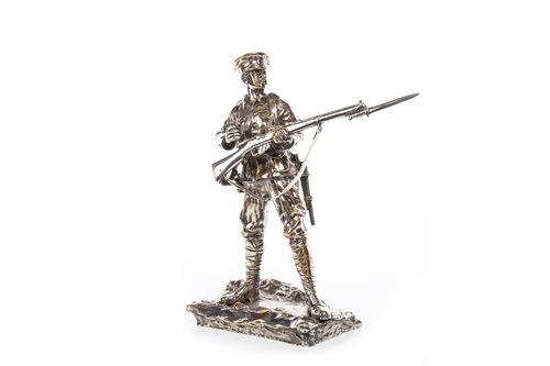 Lot 985 - A SILVERED BRONZE FIGURE OF A WWI SOLDIER