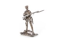 Lot 985 - A SILVERED BRONZE FIGURE OF A WWI SOLDIER