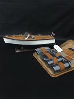 Lot 57 - A MODEL OF A SPEED BOAT ALONG WITH A GENTLEMAN'S GROOMING KIT