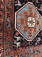 Lot 92 - AN EASTERN BORDERED RUG OF CAUCASIAN DESIGN