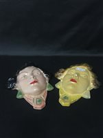 Lot 260 - A SET OF THREE ART DECO STYLE FACE WALL MASKS