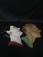 Lot 256 - FOUR ART DECO STYLE FACE WALL MASKS