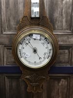 Lot 355 - AN OAK BANJO BAROMETER