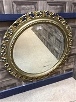 Lot 368 - A CIRCULAR BEVELLED MIRROR WITH ANOTHER MIRROR