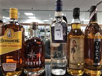 Lot 69 - A SELECTION OF RUMS AND A LIQUEUR - FIVE BOTTLES