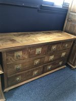 Lot 404 - A WALNUT CHEST OF DRAWERS
