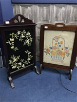 Lot 412 - A WALL MIRROR AND TWO TAPESTRY FIRE SCREENS