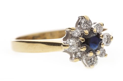 Lot 233 - A BLUE GEM AND DIAMOND RING
