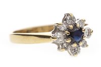 Lot 233 - A BLUE GEM AND DIAMOND RING