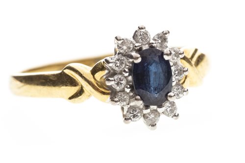 Lot 235 - A BLUE GEM AND DIAMOND CLUSTER RING