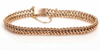 Lot 1828 - NINE CARAT GOLD BRACELET early twentieth...