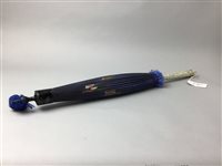 Lot 64 - AN ASIAN PARALSOL WITH EMBOSSED WHITE METAL HANDLE