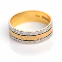 Lot 1830 - TWENTY TWO CARAT GOLD AND PLATINUM WEDDING...