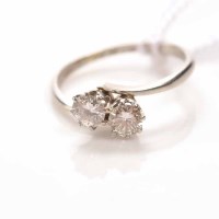 Lot 1835 - EARLY TWENTIETH CENTURY DIAMOND TWO STONE RING...