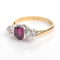 Lot 1849 - RUBY AND DIAMOND THREE STONE RING set with a...