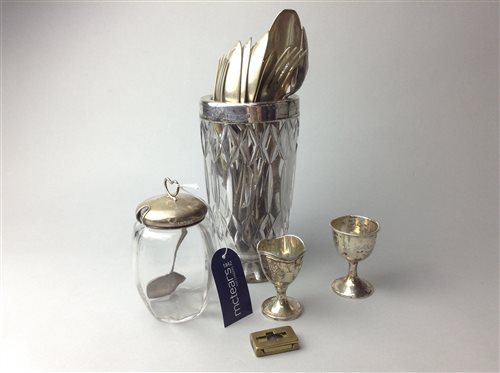 Lot 12 - A SILVER MOUNTED VASE, JAR AND EGGCUPS