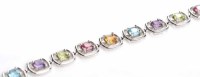 Lot 1856 - MULTI GEM SET BRACELET set with gems including...