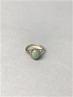 Lot 383 - A GREEN HARDSTONE RING