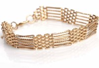 Lot 1869 - NINE CARAT GOLD GATE LINK BRACELET marked 9k...