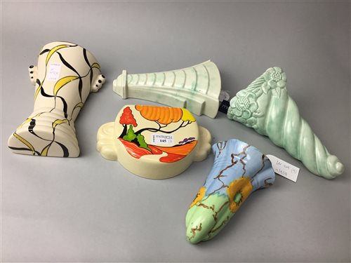 Lot 145 - A CERAMIC WALL POCKET OF CLARICE CLIFF DESIGN AND EIGHT OTHERS