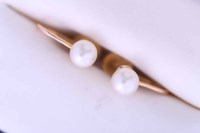 Lot 1877 - PAIR OF PEARL STUD EARRINGS each set with a...