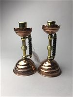 Lot 215 - A PAIR OF CANDLESTICKS IN THE MANNER OF BENSON AND TWO OTHER CANDLESTICKS