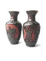 Lot 295 - A PAIR OF RED AND BLACK CINNIBAR LACQUER VASES