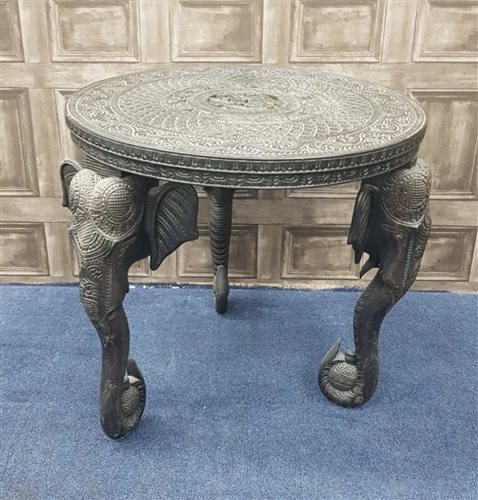 Lot 1015 - AN INDIAN EBONISED TABLE