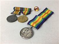Lot 335 - THREE WWI MEDALS AND AN UNMOUNTED CITRINE