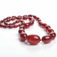 Lot 1901 - CHERRY RED BAKELITE BEAD NECKLACE with...