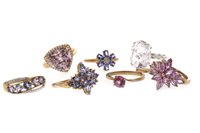 Lot 192 - EIGHT LILAC AND PINK GEM SET RINGS